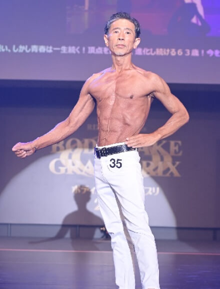 小高 健治